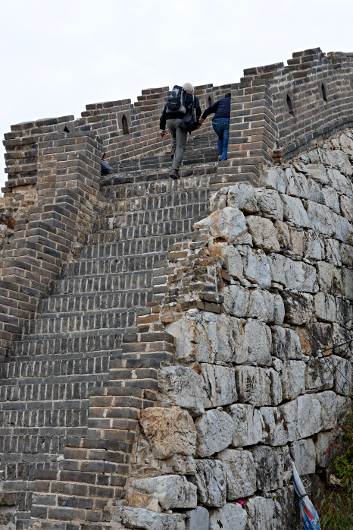 Great Wall of China at Mutianyu
 - Climbing steep stairs together