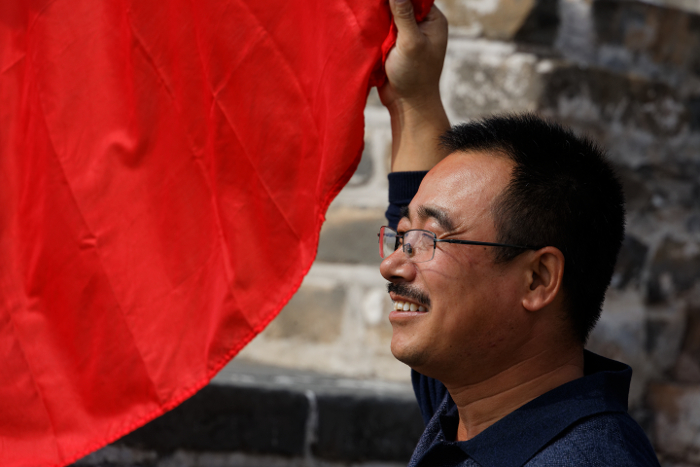 Great Wall of China at Mutianyu
 - Fellow climber posing with Chinese flag