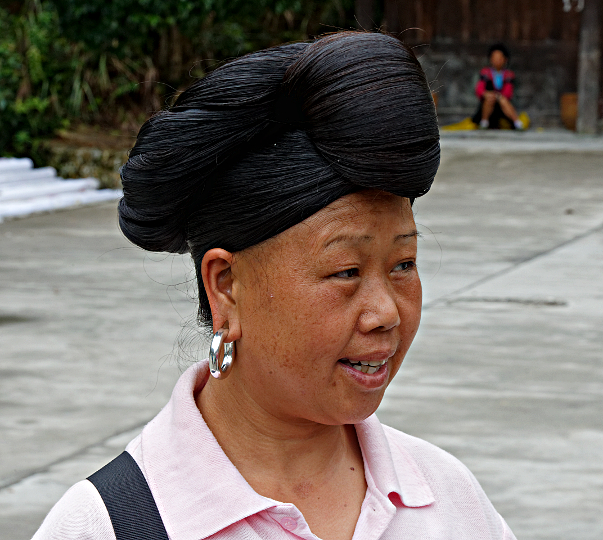 Longji Terraced Rice Paddies and the Yao People - Yao Lady - These ladies grow their hair very long and wrap it around their heads, - sometimes combined with a sort of scarf or hat