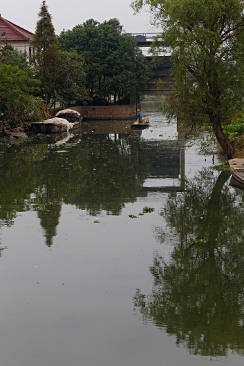 Shanghai Water Towns - Fisherman and Lock