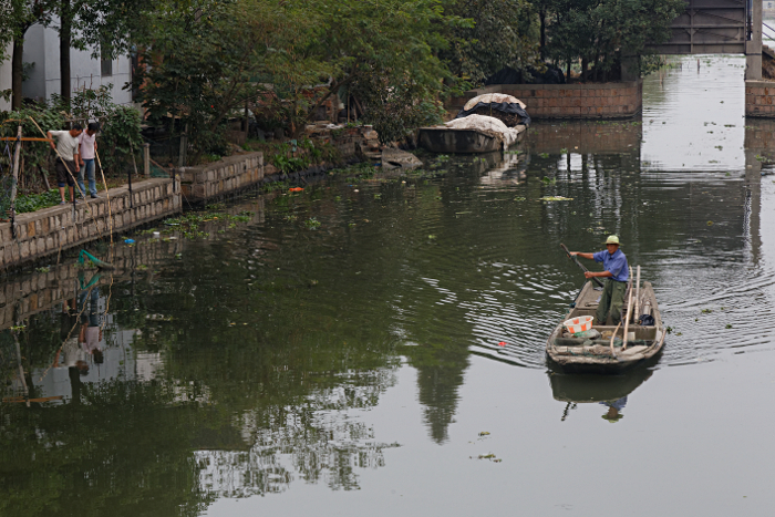 Shanghai Water Towns - Fisherman and Lock