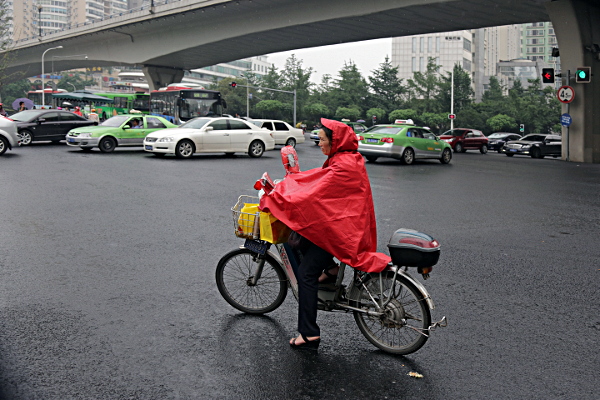 Szechuan Province, China
 - It rained a lot while we were in Chengdu. - The riders know how to stay a little dry