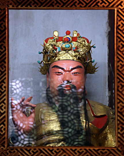 Szechuan Province, China
 - Confusian Image at Buddhist Temple, Changdu. - I thought the hand position and the long ears are Buddhist.