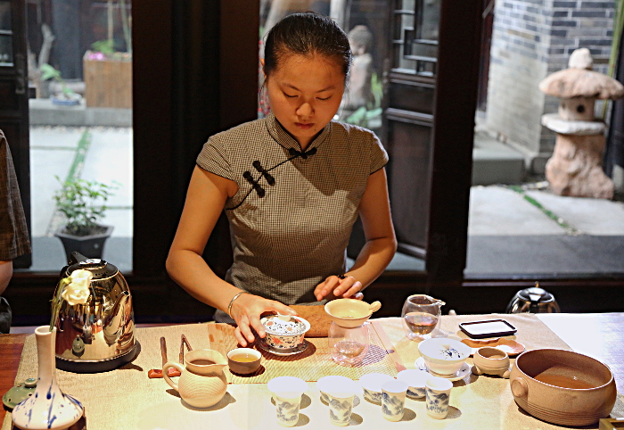 Szechuan Province, China
 - Serving Tea at a Tea House