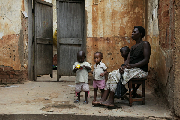 Visit to Kakungulu's House, Gangama, at the Foot of Mount Elgon, Uganda - Caretaker's Wife and Children