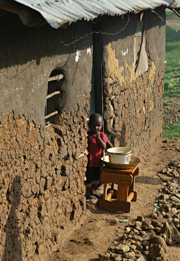 Visiting the Abayudaya in Nabugoye, Uganda - Little Boy Outside His Home