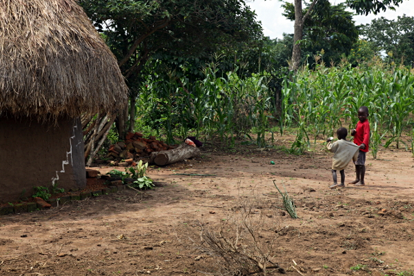 Visiting the Abayudaya Tribe in Putti, Uganda - Two Children Outside Wigwam