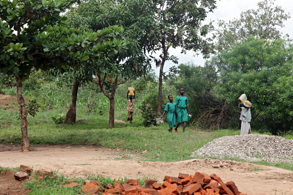 Visiting the Abayudaya Tribe in Putti, Uganda - Ladies Going Home from the Well