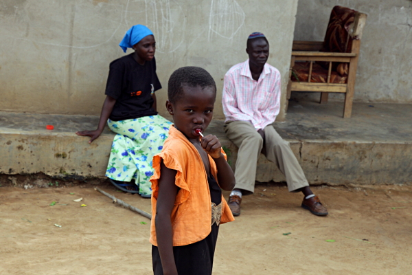 Visiting the Abayudaya Tribe in Putti, Uganda - Girl with Lollypop from Israel