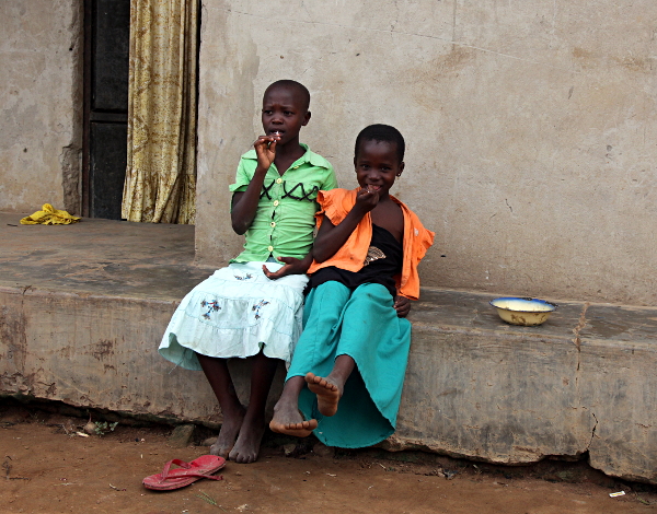 Visiting the Abayudaya Tribe in Putti, Uganda - Girls with Lollypops Outside their House