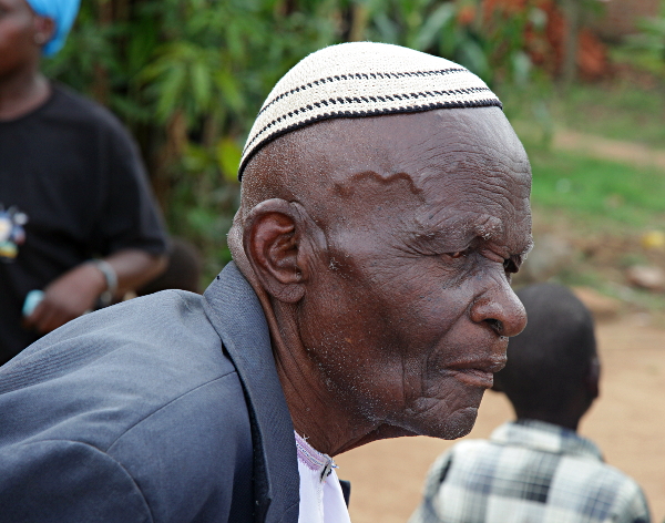 Visiting the Abayudaya Tribe in Putti, Uganda - Kakungulu's Nephew Outside the Shule