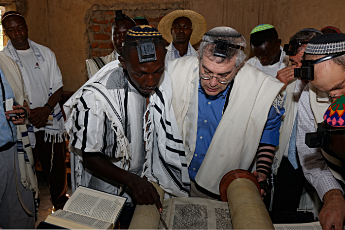 Putti Synagogue, Uganda
 - Ari Greenspan With Moshe Reading the Torah