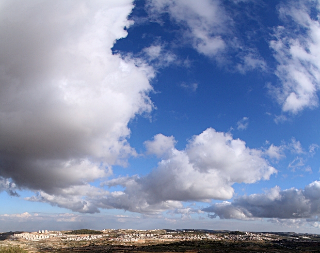 Panoramic View of Efrat Under Clouds