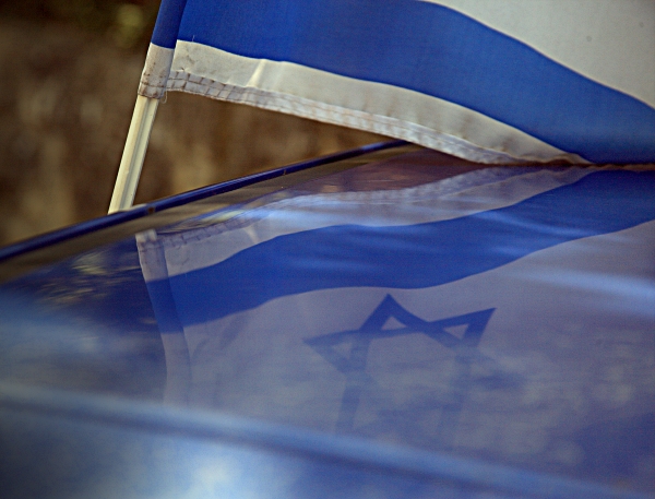 The Israeli Flag - Reflecting on a car roof