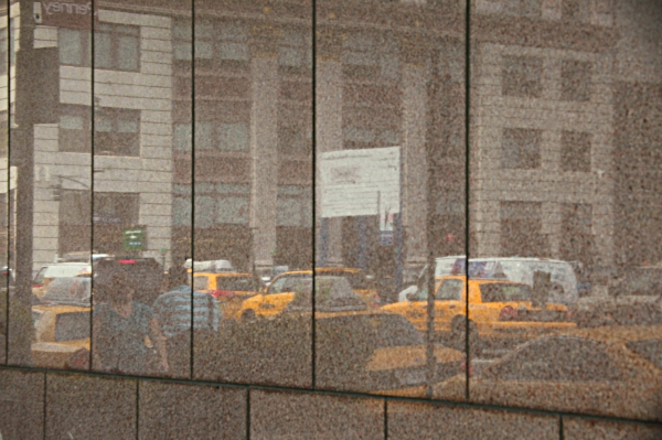 August in the US - Cabs on 8th Avenue, New York City