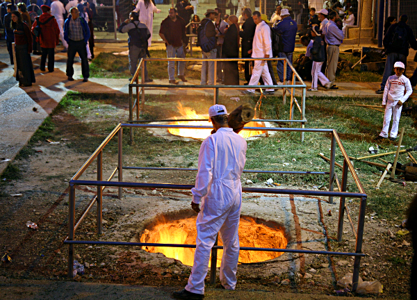 Samaritan, Shomronim, Passover Sacrifice - Throwing logs into the cooking pit