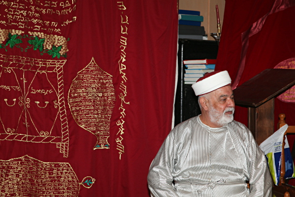 Samaritan, Shomronim, Sukkot,Tabernacles - Yosef Cohen sitting next to the 