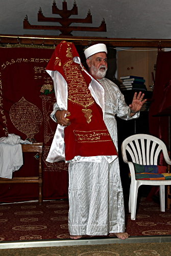 Samaritan, Shomronim, Sukkot,Tabernacles - Yosef Cohen holding a covered Sefer Torah