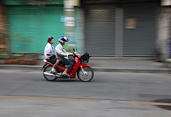 Thailand - Daddy Taking his Daughter to School